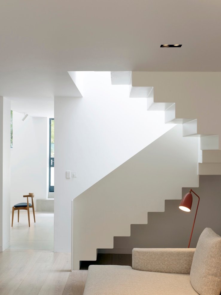 Another example of negative space. - Rather than filling a space let it talk for itself.  Here the space under the stairs offers an architectural feature.  Obviously there are times when the space under the stairs offers crucial storage space but if you have the opportunity … approach it differently.